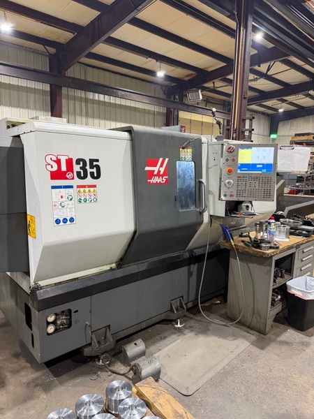 Haas #ST-35, CNC lathe, 31.7" swing, 12" chuck, 4" bar, 21" turning diameter, 26" length, 40 HP, 3200 RPM