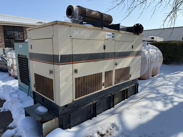 100 KW Olympian, Diesel Generator Set, 480 Volt, base fuel tank, sheet metal enclosure, 1,128 hours