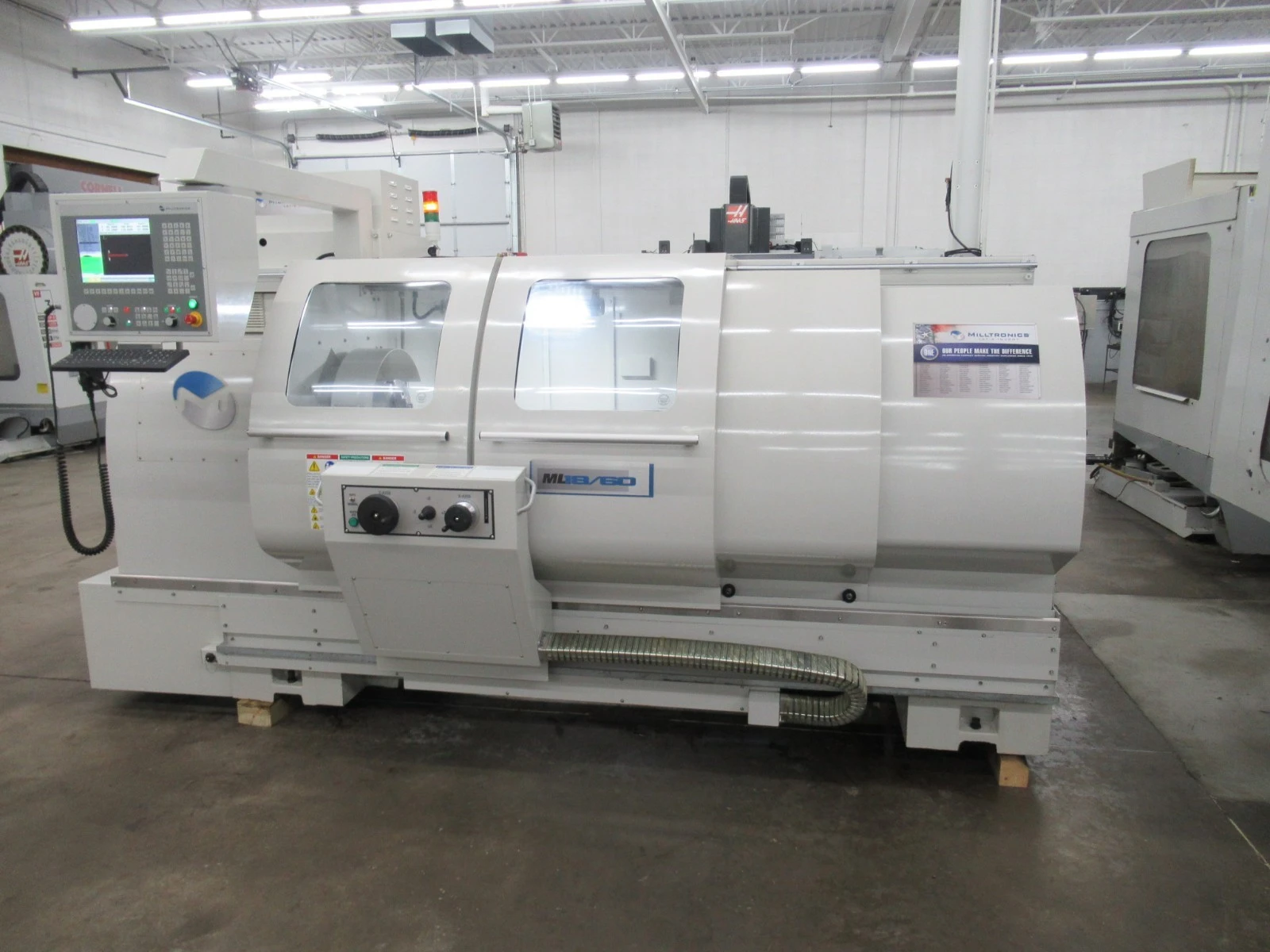 Milltronics #ML18/60, CNC Lathe, 19" swing, 60" centers, 9.25" socs, 10" chuck, 2.56" spindle bore, 24/15 HP