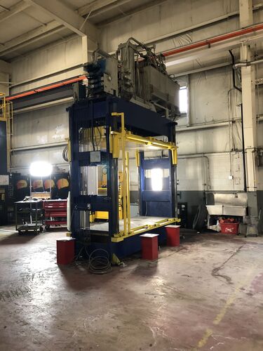 100 Ton, HSI, down-acting hydraulic spotting press, 50" stroke, 78" daylight, 100" x 42" bed & ram, 45&deg; tilt