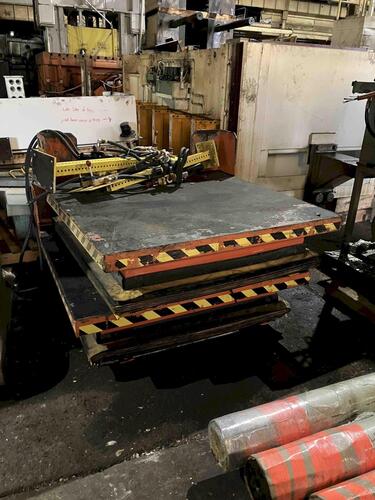 4,000 lb. Scott Industries, air lift table, 54" x 56" platform (4 available)