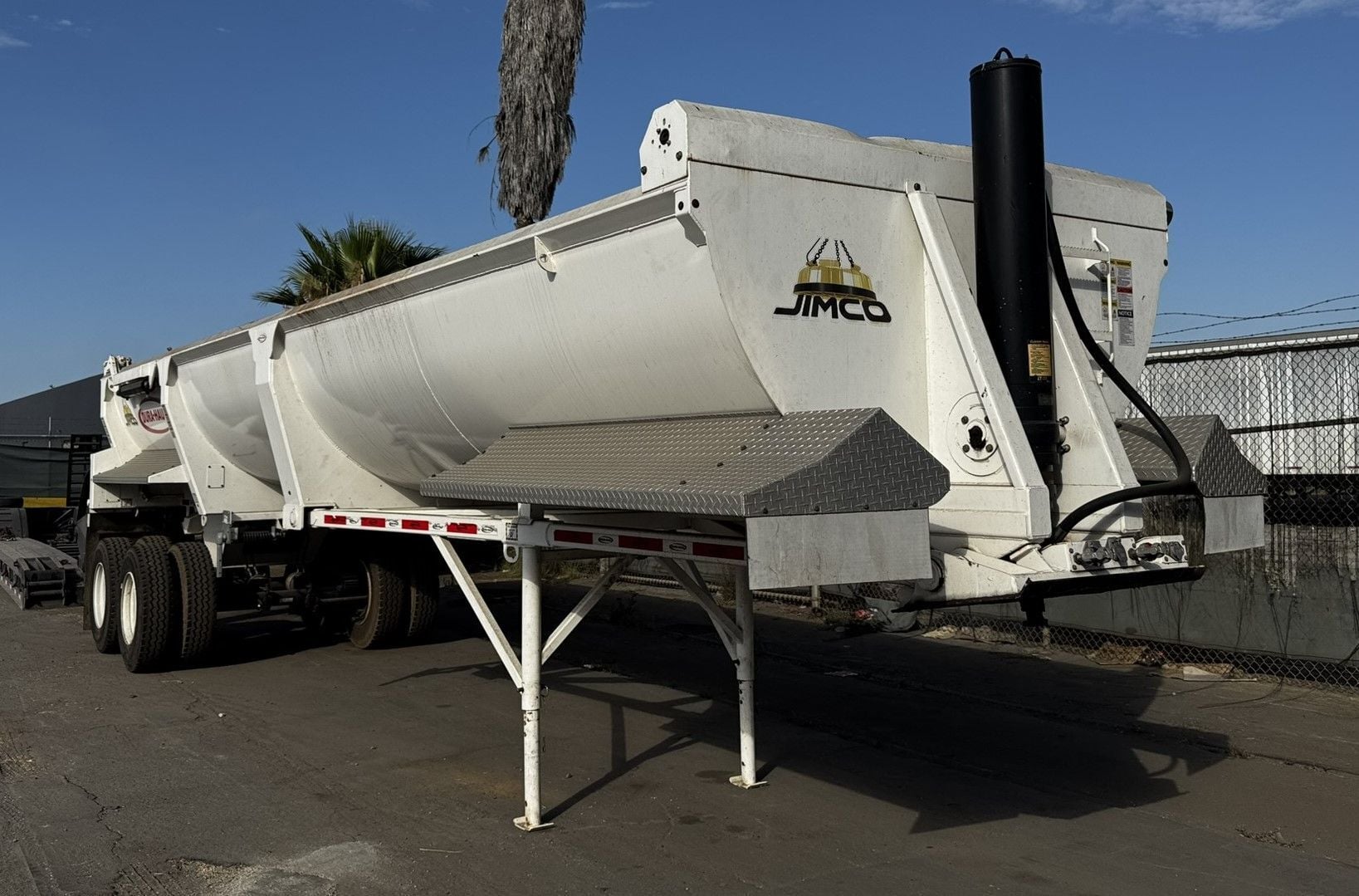 Dura-Haul, Half-Round End Dump Trailer, 34' L x 102" W trailer, tandem axle, front-mounted inverted hydraulic