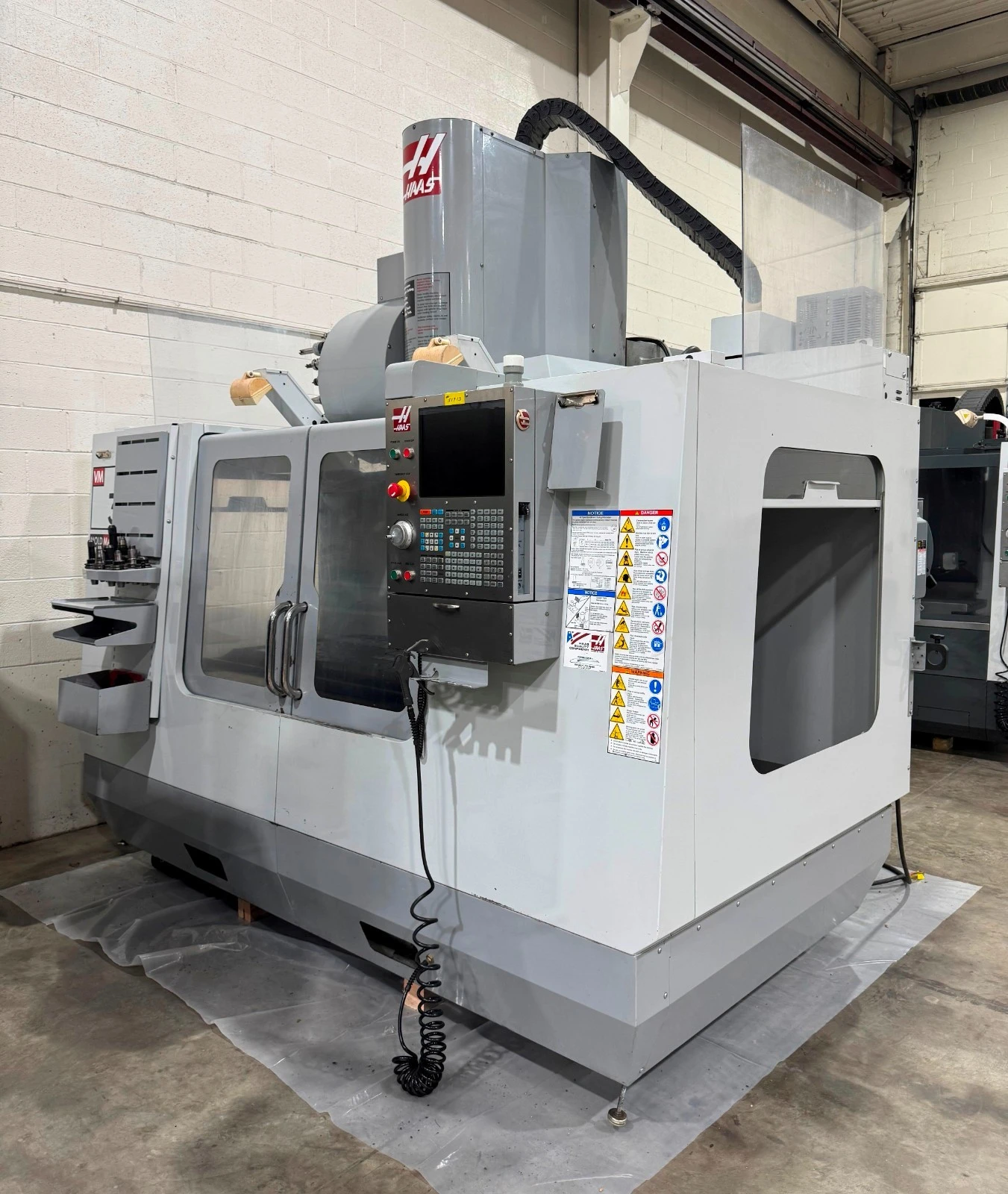 Haas #VM-3, CNC Vertical Machining Center, 40" X, 26" Y, 25" Z, 54" x 25" table, 30 HP, 12,000 RPM, CAT 40