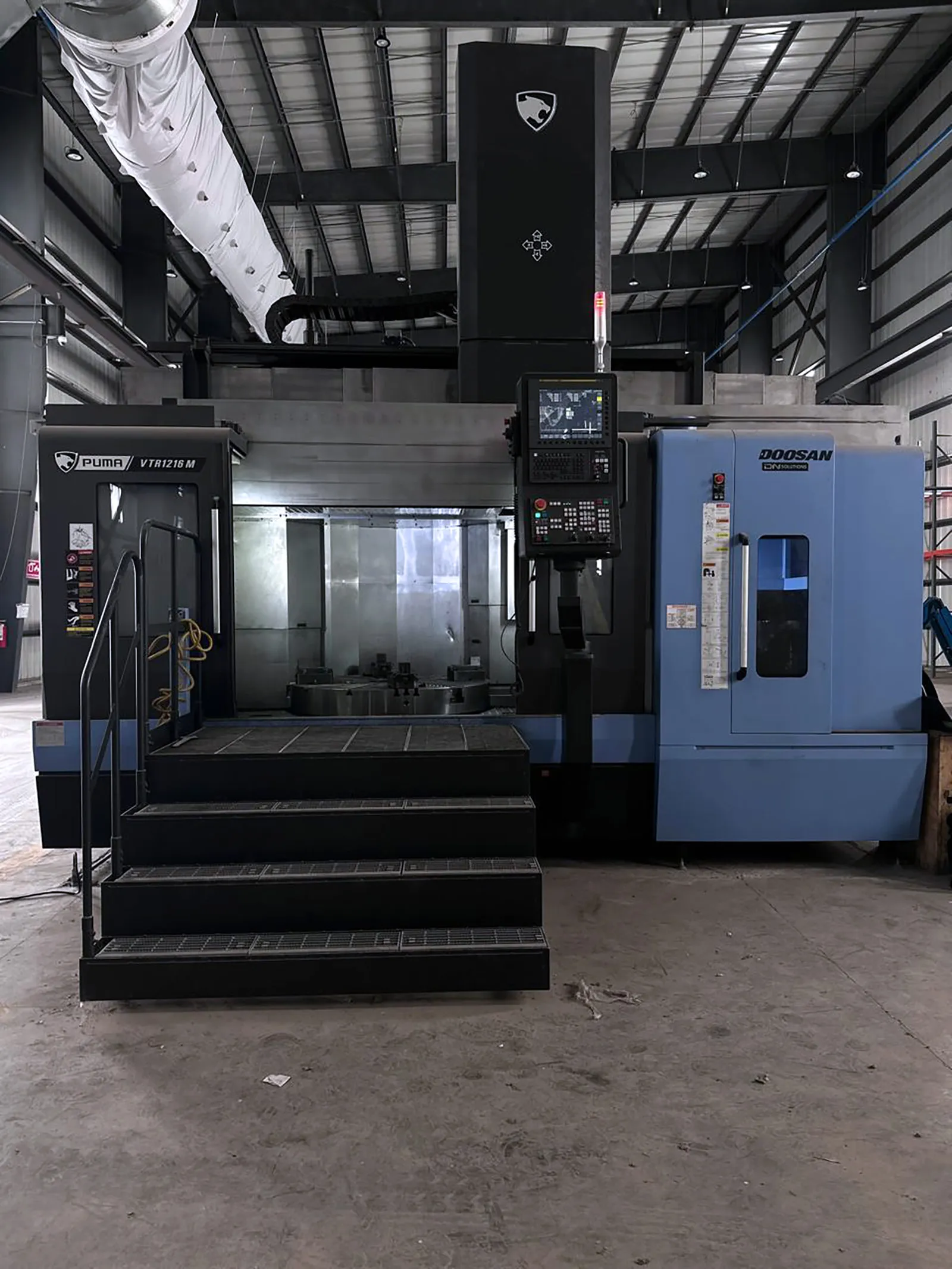 63" Daewoo Doosan #VTR1216-M, CNC vertical turret lathe, 49" turning height, 67" X, 47" Z, 400 RPM, 60 HP