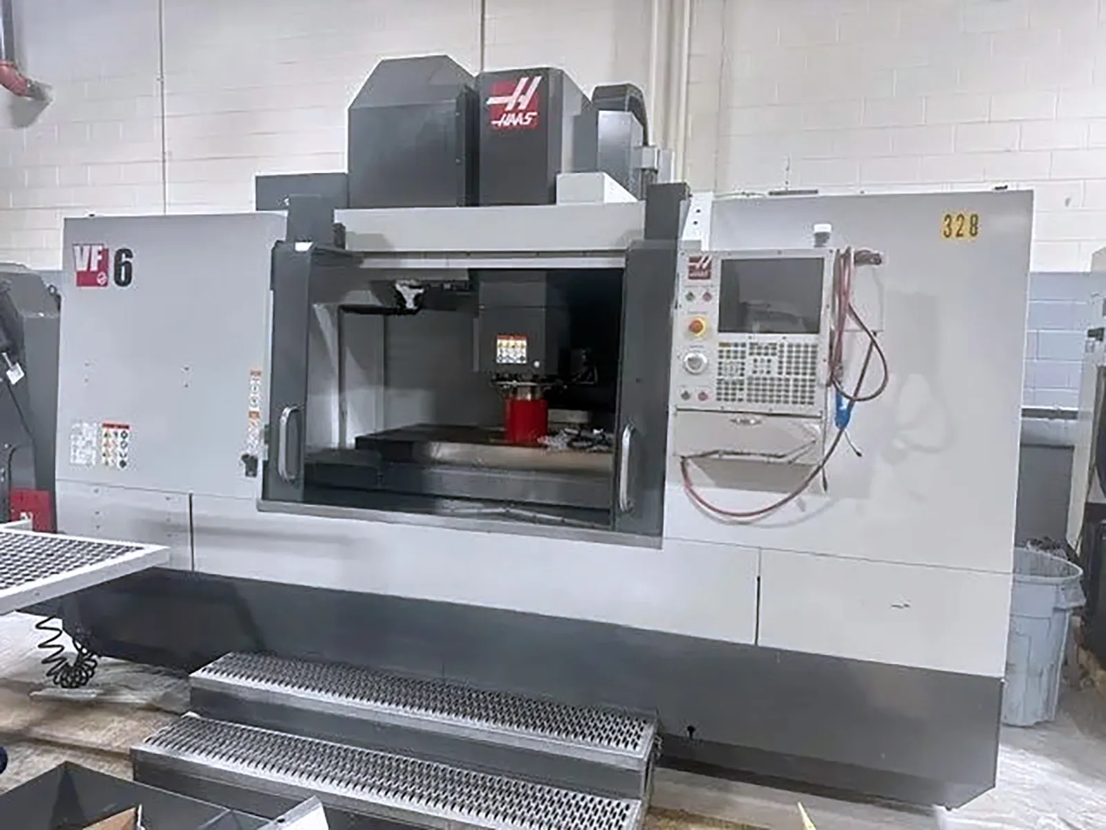 Haas #VF-6/50, CNC vertical machining center, 30 automatic tool changer, 64" X, 32" Y, 30" Z, 7500 RPM, #50