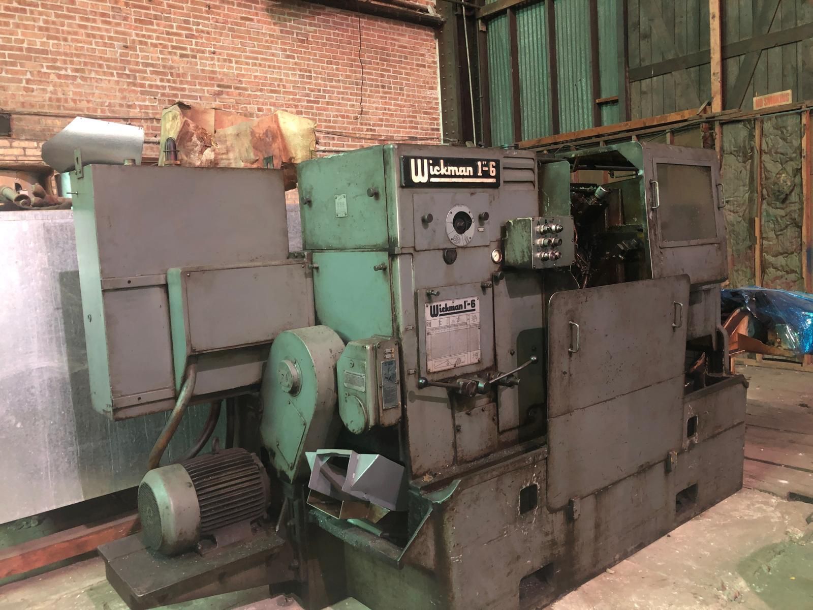 Wickman #1" x 6 spindle, electromagnetic clutch, chip conveyor, stock reel & stand, serial #16100, 1976