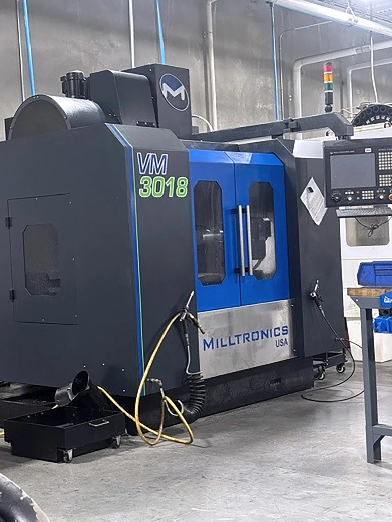 Milltronics #VM3018, CNC vertical machining center, 24 automatic tool changer, 30" X, 18" Y, 20" Z, 10000