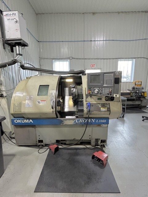 Okuma #Crown-L1060, CNC lathe, 21.6" swing, 19.68" machining length, 8" chuck, 2" bar, 3500 RPM, 12 station