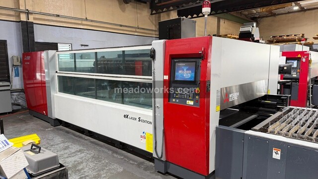 Mitsubishi #ML3015eX, CNC CO2 Laser, 2700 watt, 5' x 10' table, M7000 control, dual pallet shuttle table, 10