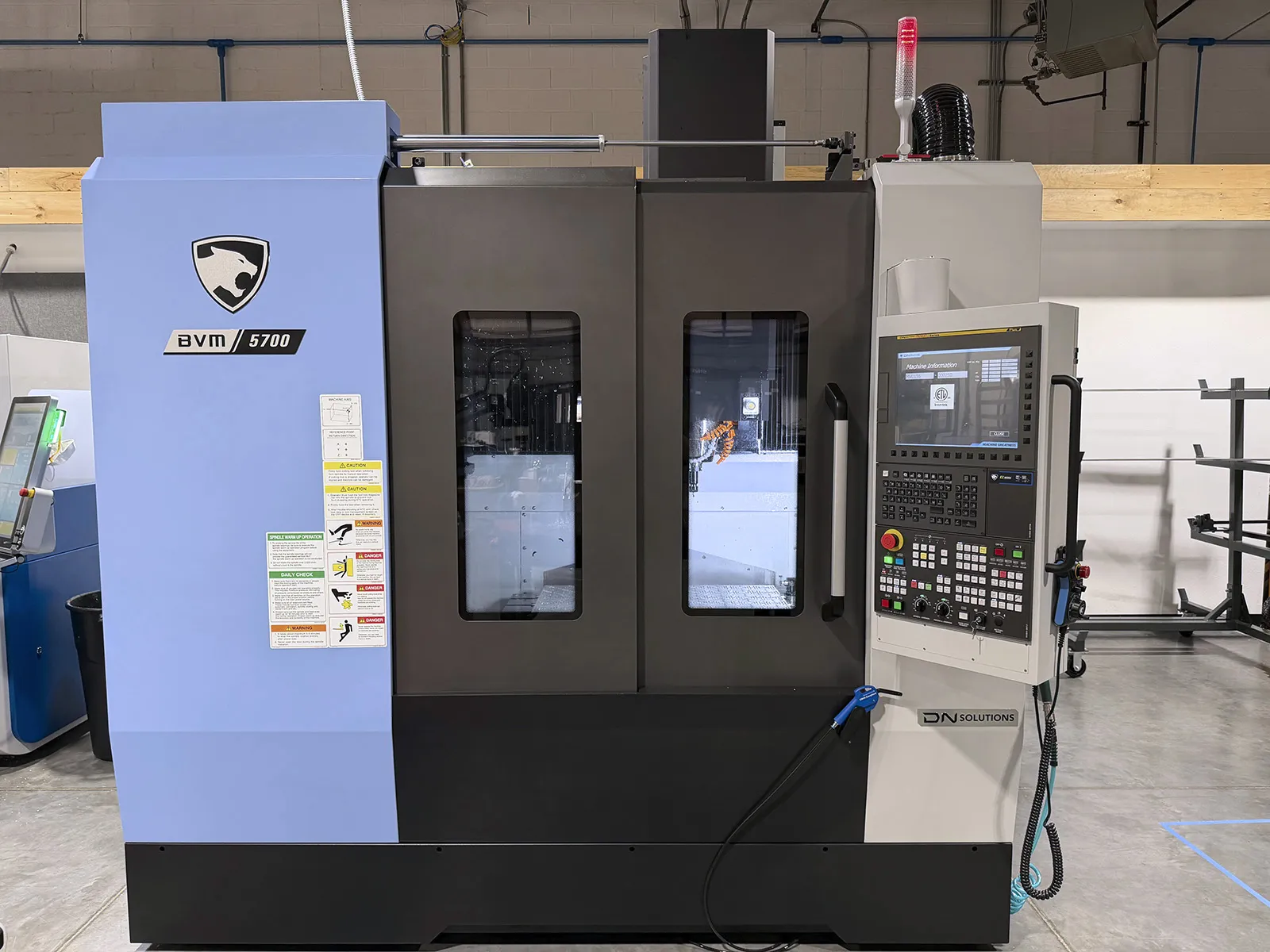DN Solutions #BVM-5700, CNC vertical machining center, 40 automatic tool changer, 41.3" X, 22.4" Y, 18.1" Z