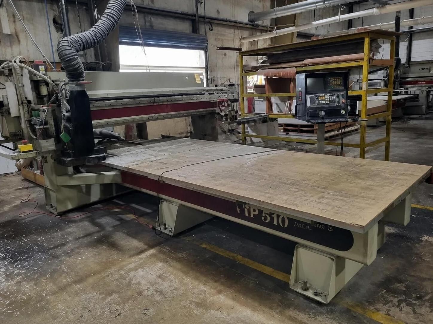 Komo #VR510, CNC Router, 5' x10', 15 HP, 24000 RPM, 10 tool, 10" clearance, Fanuc 210i w/ PC, 2003