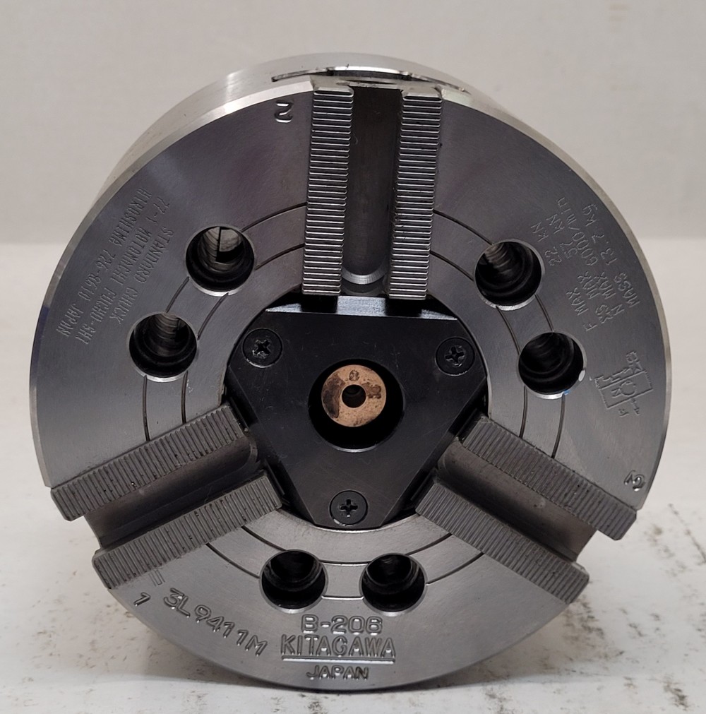 6" Kitagawa #B-206, 3-jaw power chuck, 1-3/4" thru hole, 6000 RPM, 12,555 lb. gripping force, less top jaws