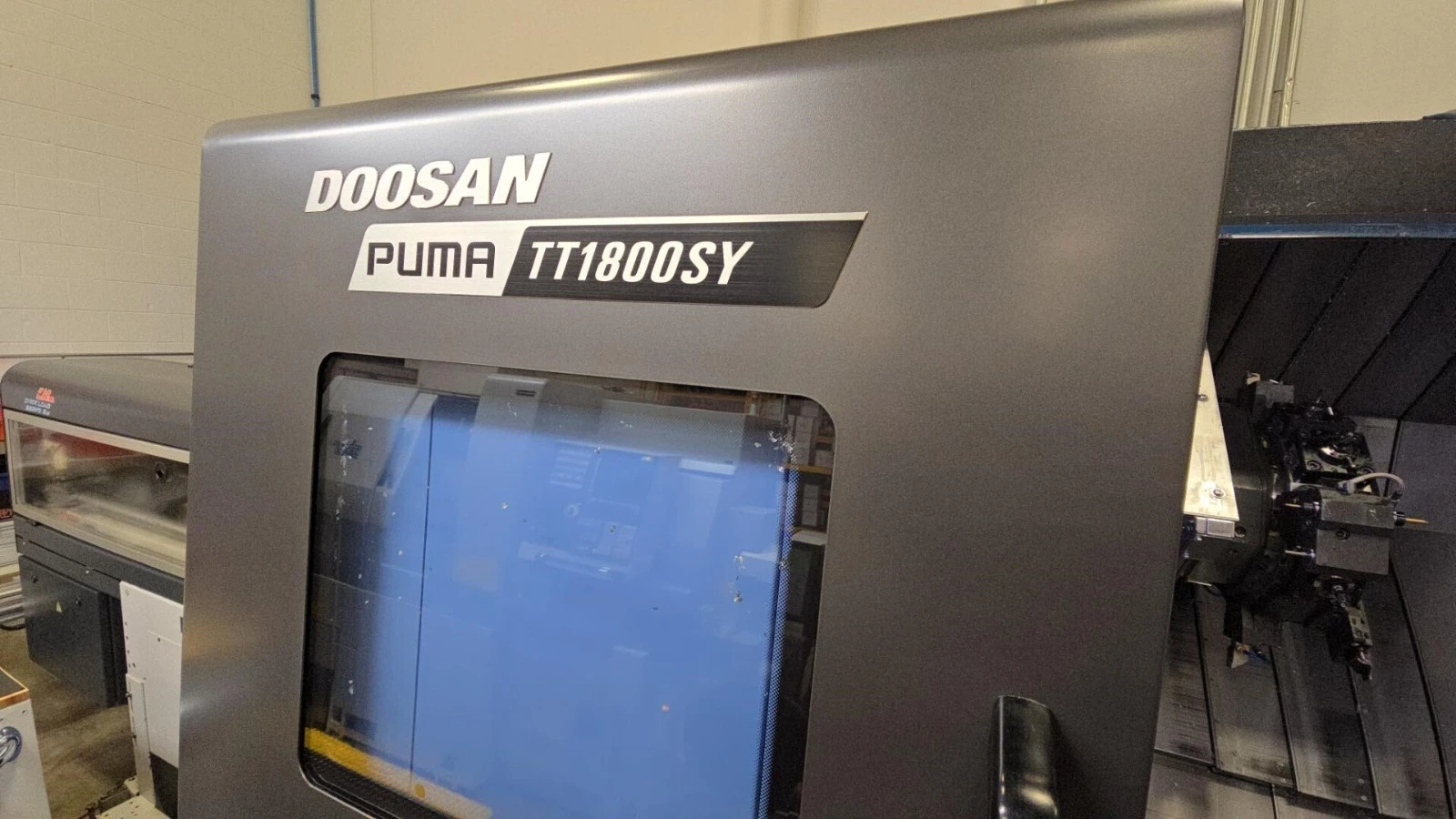 Daewoo Doosan #Puma-TT1800SY, 5-Axis CNC Lathe, 9" swing, 38.5" machining length, 8" chuck, 2.6" bar, 30 HP