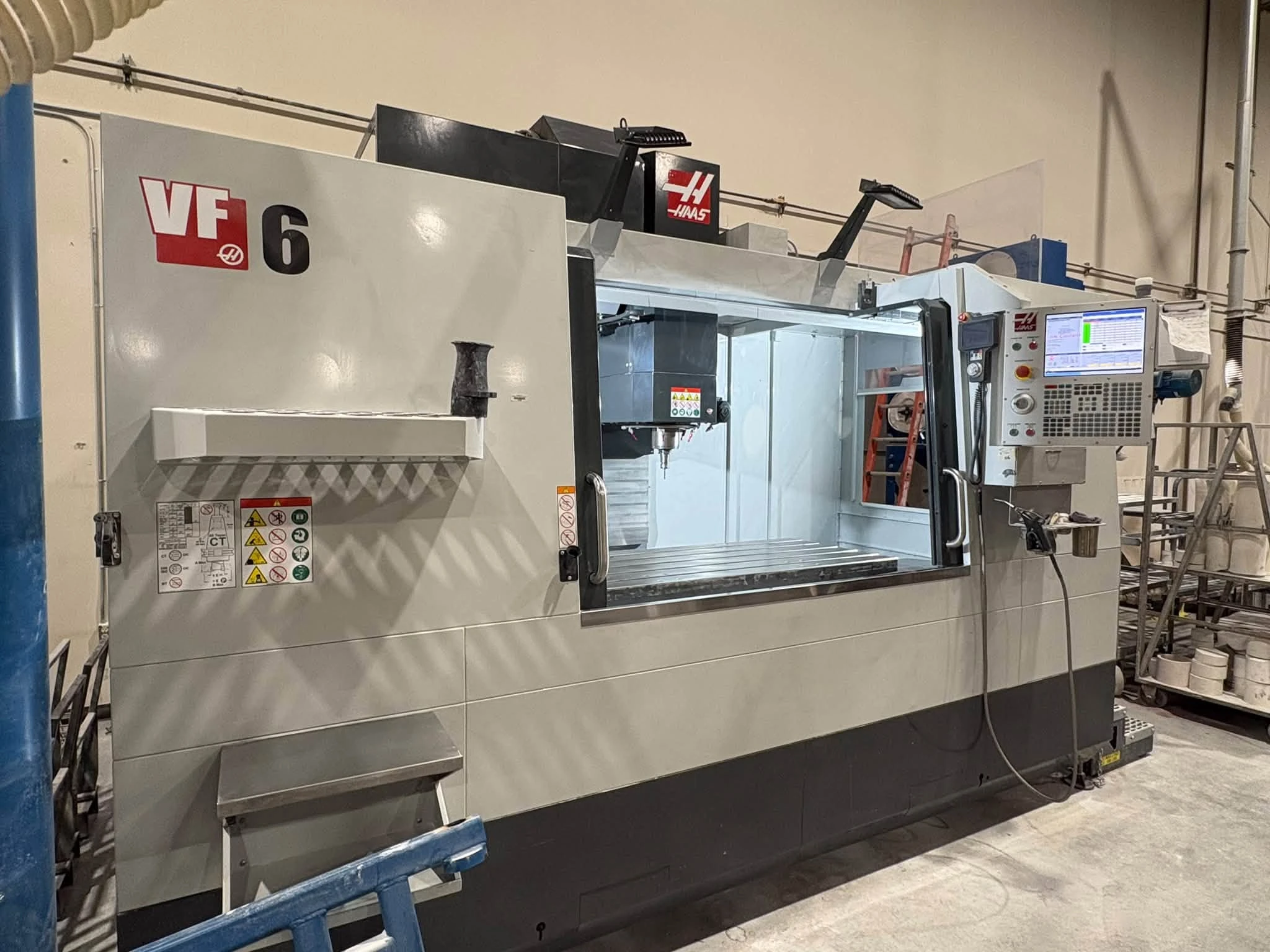 Haas #VF-6, CNC Vertical Machining Center, 64" X, 32" Y, 30" Z, 64" x 28" table, 20 HP, 10,000 RPM, CAT 40