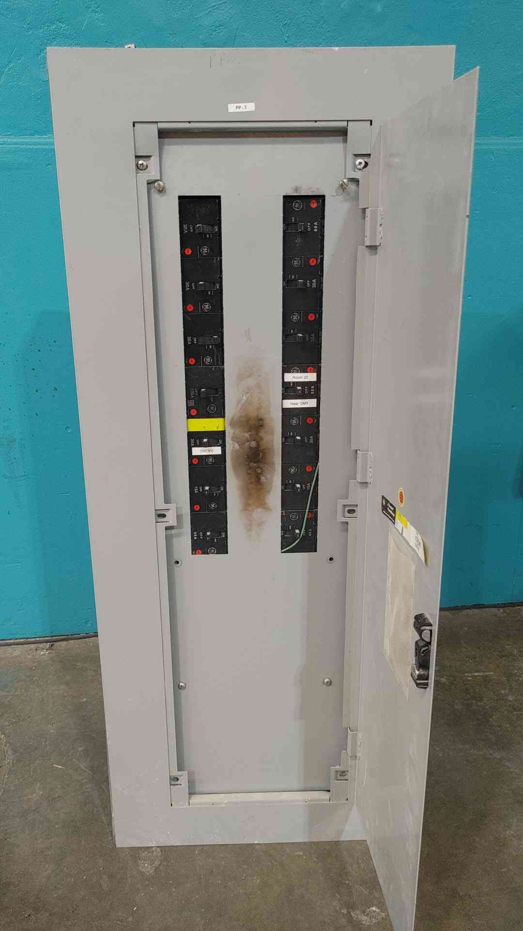 100 Amp. General Electric, A Series, Panelboard, w/ (14) 3-pole breakers, 100A, 60A, 50A, 40A, 30A, 15A