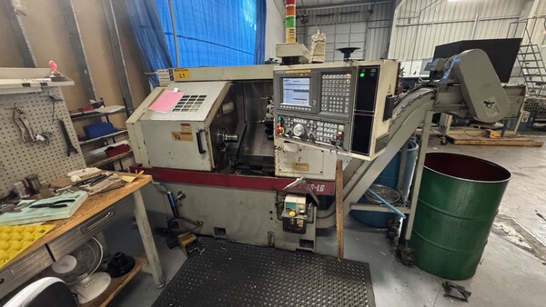 Okuma #ES-L6, CNC turning center, 17.7" swing, 11.81" swing over cross slide, 11" centers, 2.36" bore, 2"