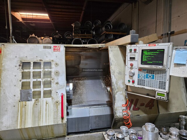Haas #HL-4, CNC Lathe, slant bed, 2-axis, 12 station turret, tailstock, Haas CNC control, 208/230 V., 1997
