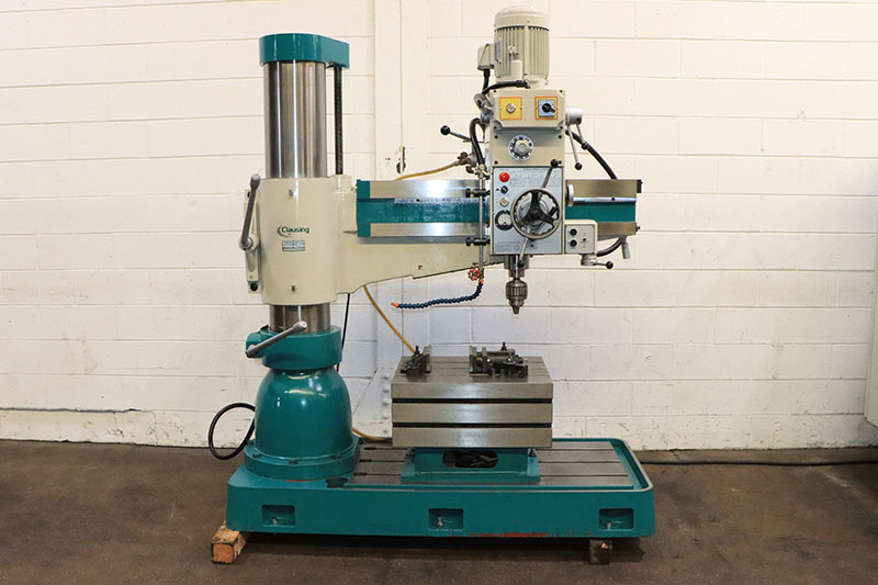 3' 6"-10" Clausing #CL1100, radial arm drill, 48" x29.1" base, 44-1500 RPM, #4MT, 9.05" spindle travel, power
