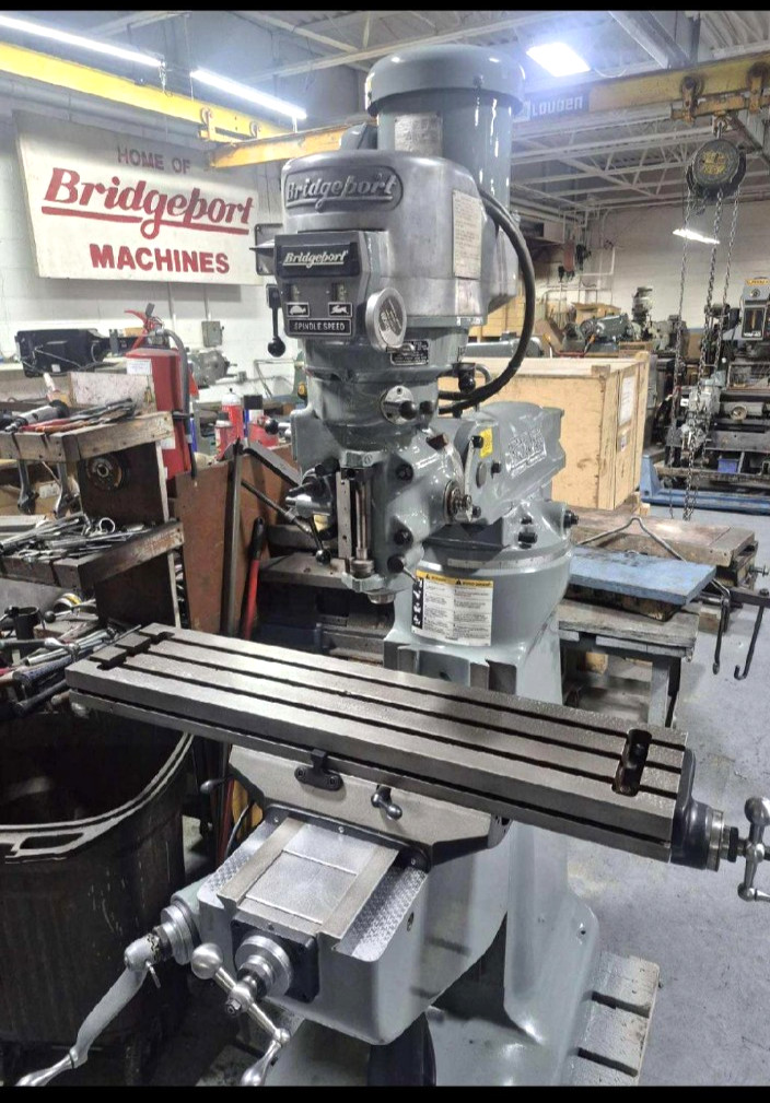 Bridgeport, Vertical Milling Machine, 48" x 9" table, 2 HP, R8, digital read out, power feed, 220 V.