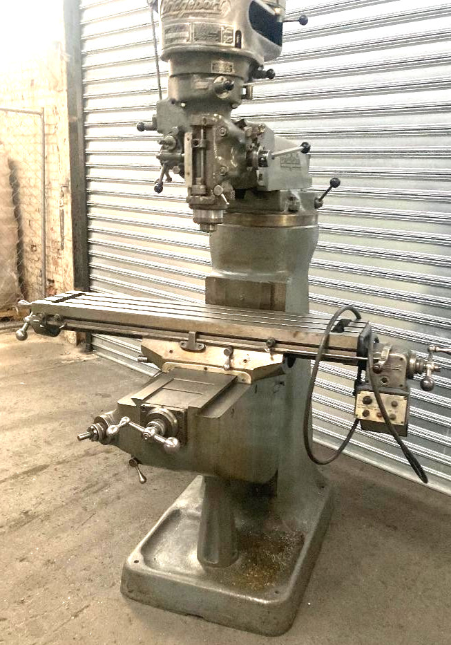 Bridgeport, Vertical Milling Machine, 9" x 42" table, 1 HP, power feed, 220 V.