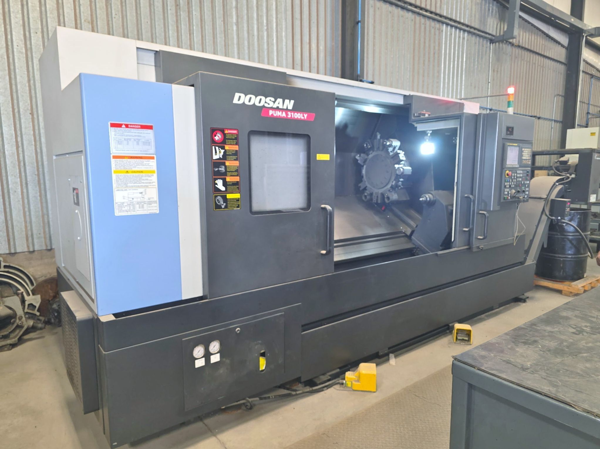 Daewoo Doosan #Puma-3100LY, CNC lathe, 33.4" swing, 16.53" x 50.4" max, 12" chuck, 4" bar, 30 KW, 2800 RPM