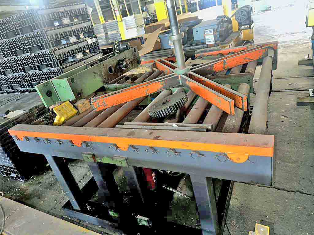 10000 lb. Banding table, 72" outside dimension, manual lift and rotate, 4 arm cross, 3.5" diameter x 76" face