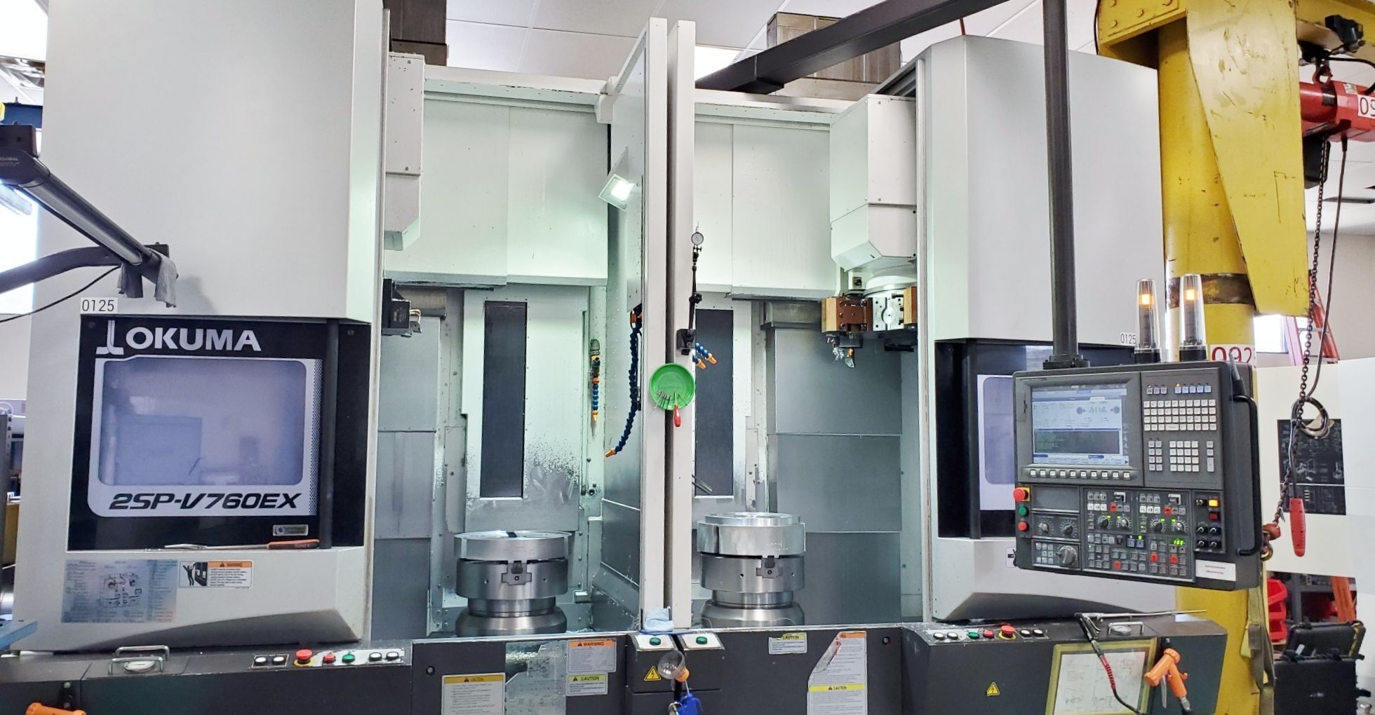 Okuma #2SP-V760EX, twin spindle CNC vertical lathe, 31.5" swing, 29.92" diameter, (2) 18" chucks, (2) 12