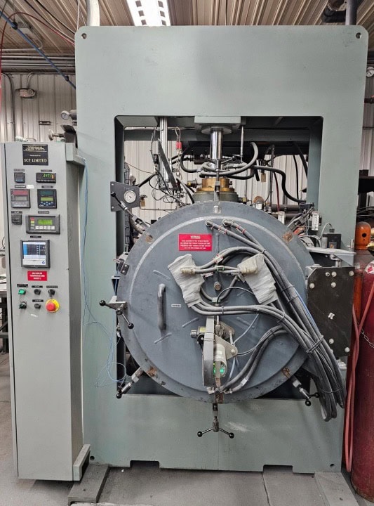 14" width x 16" D x 14" H, SCP, vacuum hot press, 50 Ton, 2000°C, 5" diameter graphite rams, 120 KW, 480 V.