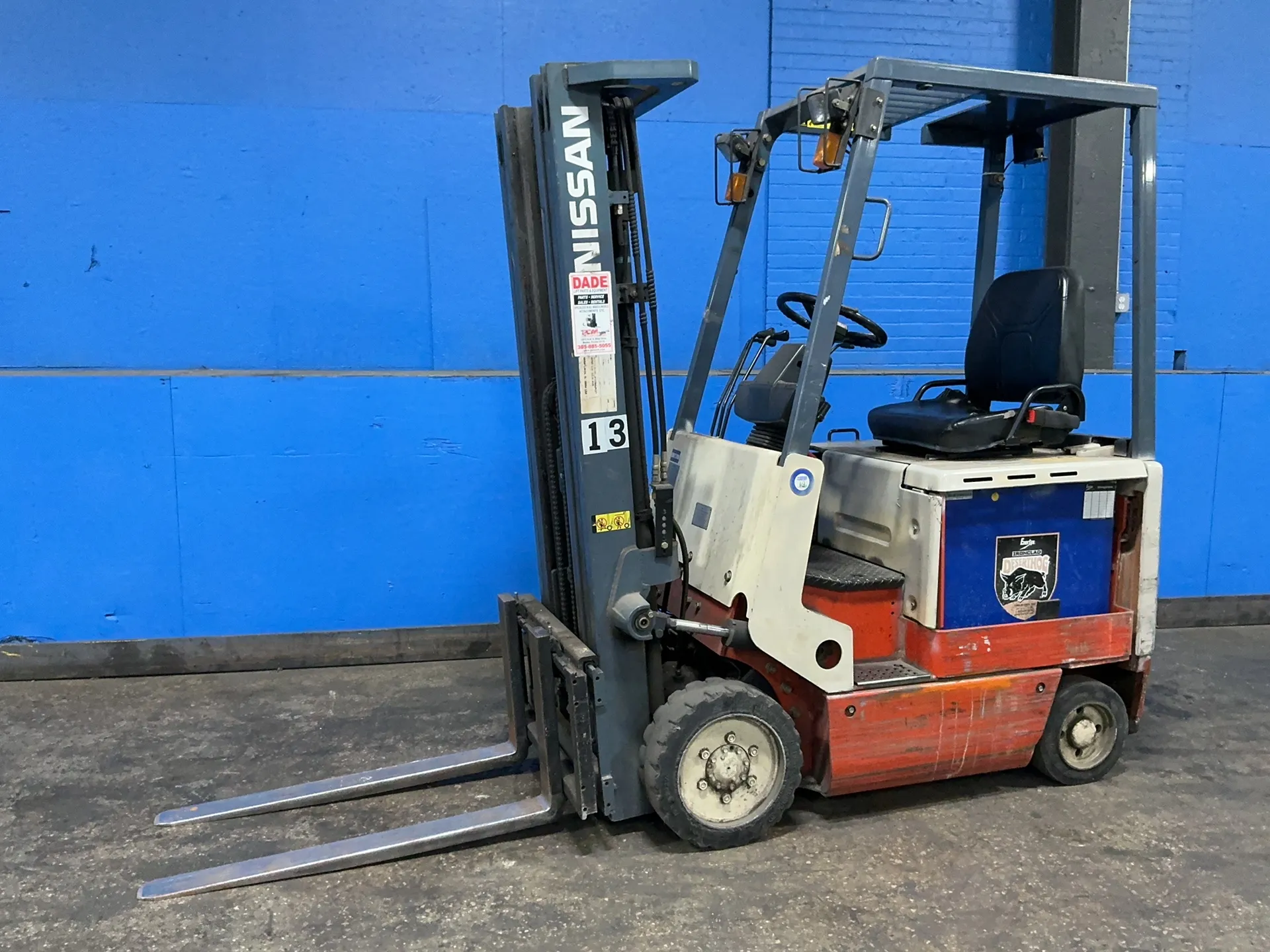 2,350 LB Nissan #CSPO1L5S, electric forklift, 187" lift height, 85" mast height, 4" x 42" forks, 36 V.