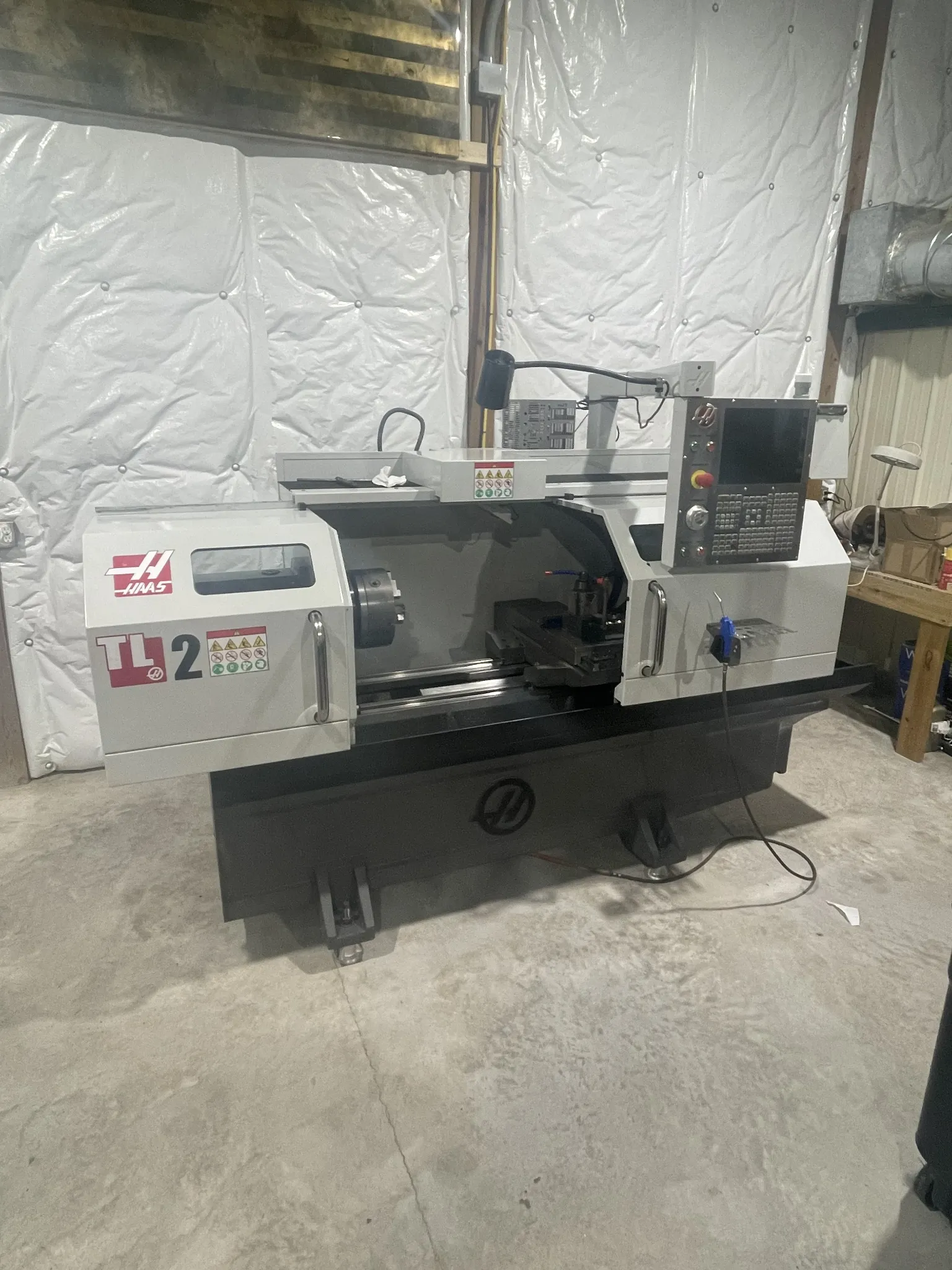 Haas #TL-2, CNC Lathe, 20" swing, 48" machining length, 16" turning diameter, 8" chuck, 12 HP, 2000 RPM