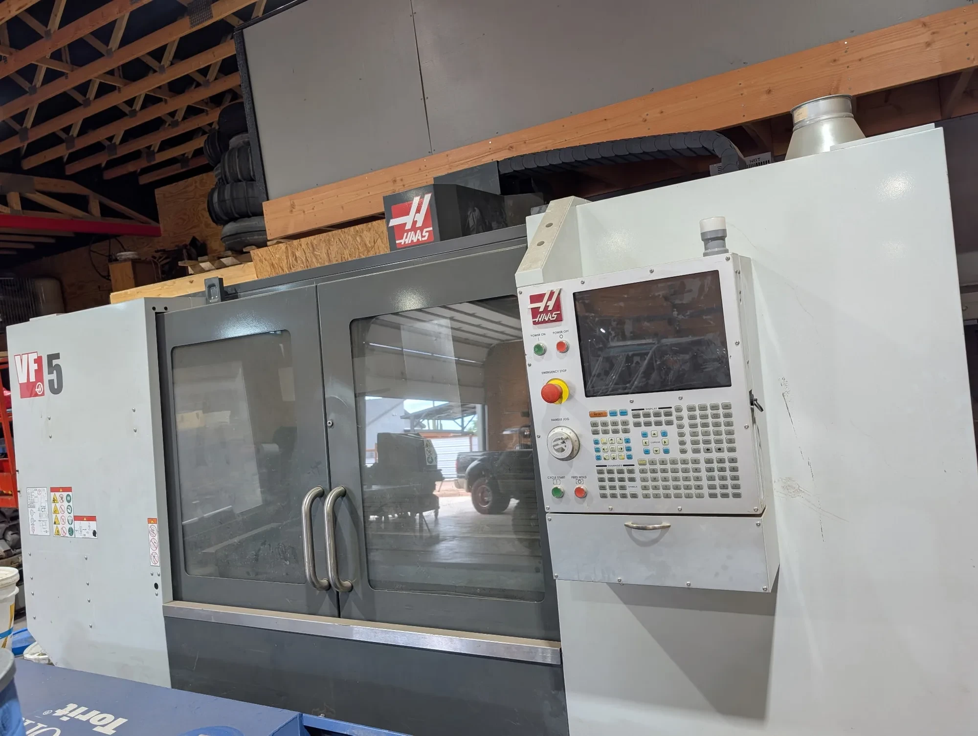 Haas #VF-5, CNC Vertical Machining Center, 50" X, 26" Y, 25" Z, 52" x 23" table, 20 HP, 10,000 RPM, CAT 40