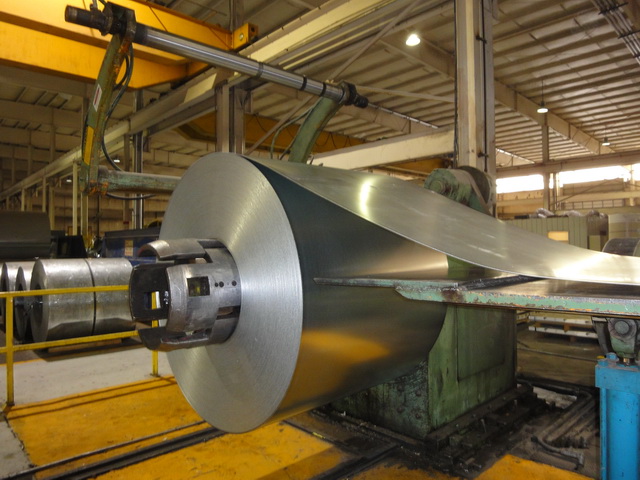 60" x .125" UMI, slitting line, 40,000 lb., .010" - .125" thick, 7" arbor, 1979