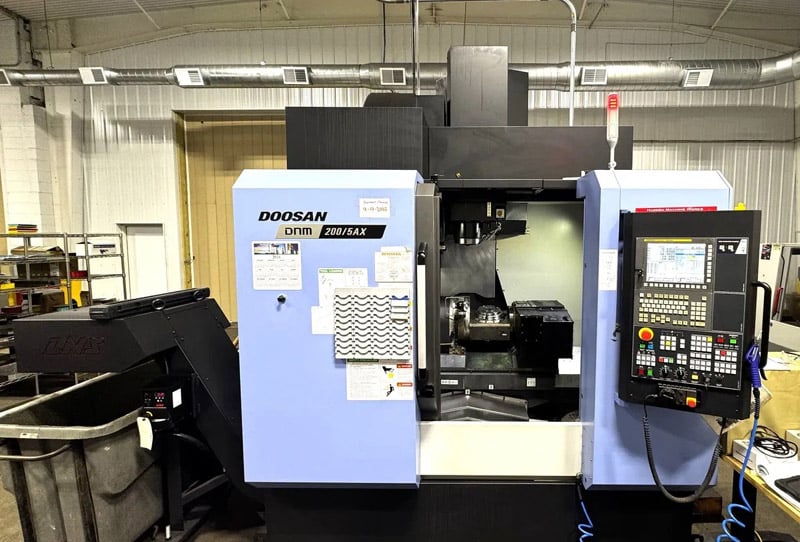 Daewoo Doosan #DNM-200/5AX, 5-Axis CNC mill, Fanuc i Series Control, 15.7" X, 17.1" Y, 19.6" Z, 12000 RPM, 40