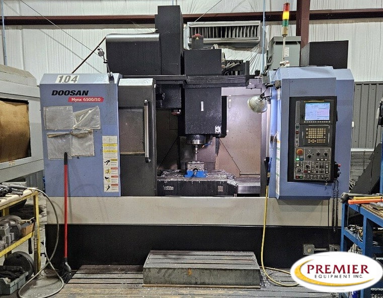 Daewoo Doosan #Mynx-6500/50, CNC vertical machining center with rotary table, Fanuc i Series, 50" X, 26.4" Y
