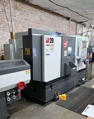 Haas #ST-20, CNC chucker lathe, 31.75" swing, 15" diameter x 20.5" L max, 8.3" chuck, 2" bar, 12 turret, 20