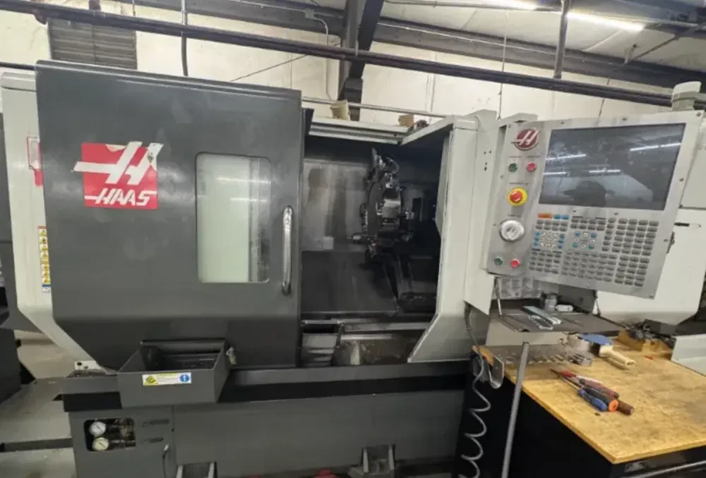 Haas #DS-30SSY, 4-Axis CNC Lathe, 31.7" swing, 23" machining length, 16" turning diameter, 10" chuck, 3" bar