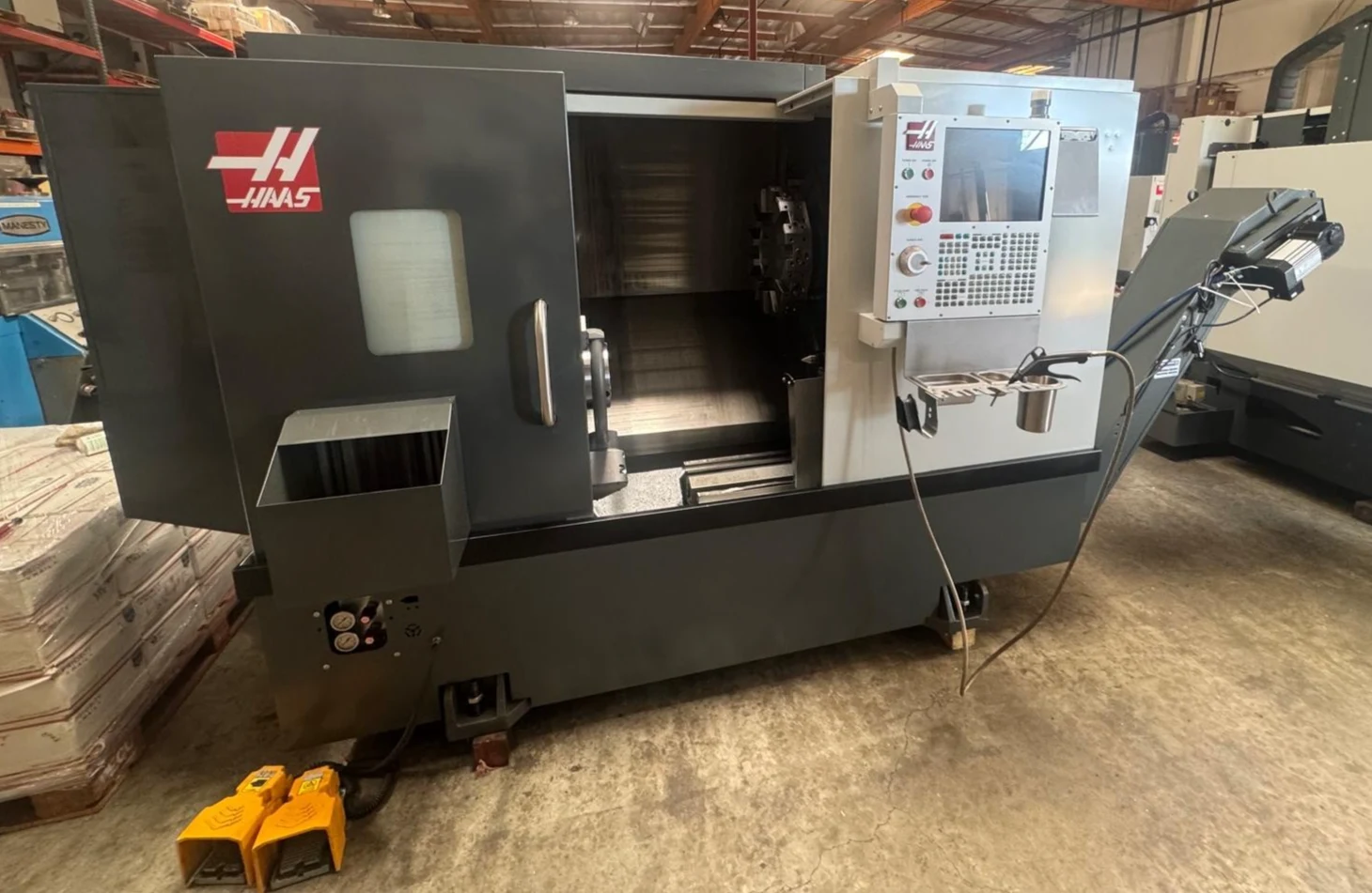 Haas #ST-20, 2-Axis CNC Lathe, 31.7" swing, 20.5" machining length, 15" turning diameter, 8" chuck, 2" bar