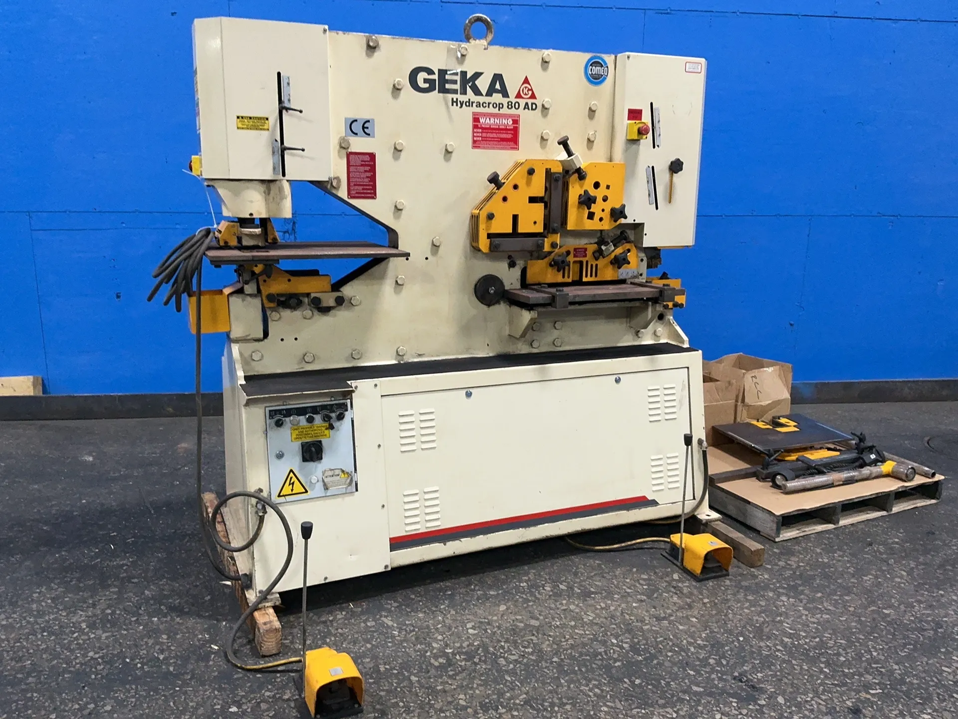 5.1" x 5.1" x 0.51" Geka #HYD-80, ironworker, 65,000 PSI, 9" x 27" and 21" x 25" tables, foot switch, 480 V.