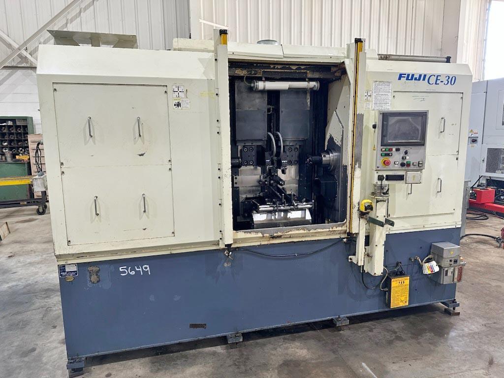 Fuji #CE-30, CNC double end facing & centering machine, Fanuc 18iT, 23.6" work length, 2002