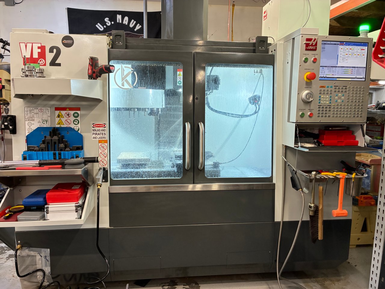 Haas #VF-2, CNC vertical machining center, 30" X, 16" Y, 20" Z, 20+1 automatic tool changer, NGC controllers