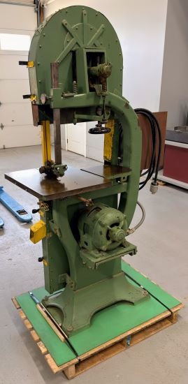 19" x 10" Northfield, woodworking vertical band saw, 18" x 22" tilting table, 1 HP direct drive, 220/440 V.