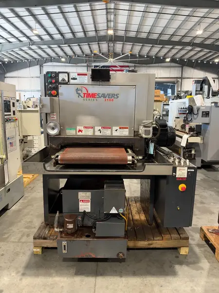 25" x 60" Timesavers #2111-12-0, wet metal belt sander, Stainless Steel tub head, 0-5" passline, 6" drum