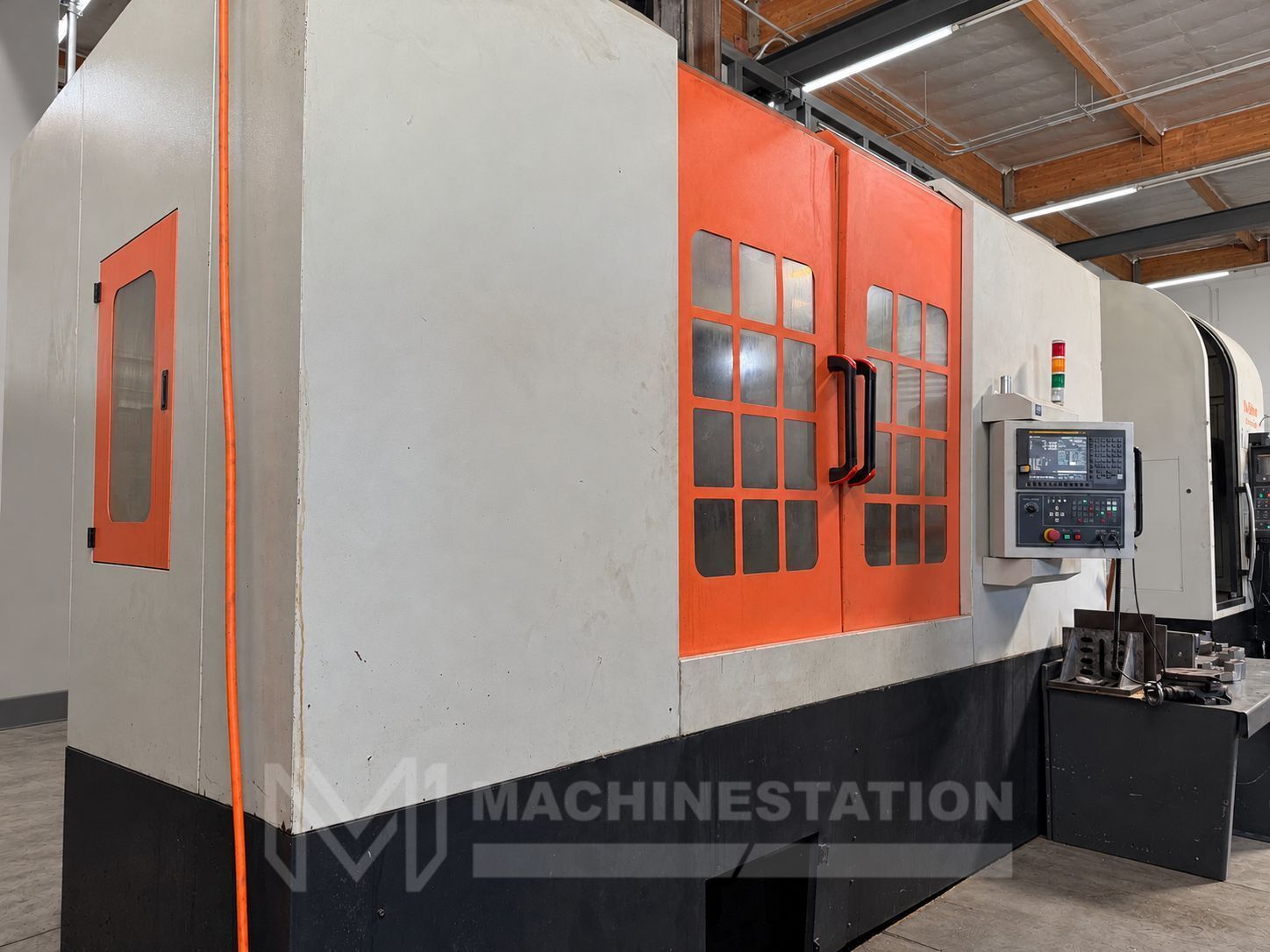 39.3" DMTC #CGK5112JD, CNC vertical turret lathe, 47.24" swing, 39.37" 4-jaw chuck, 39.37" max height, 27.55"