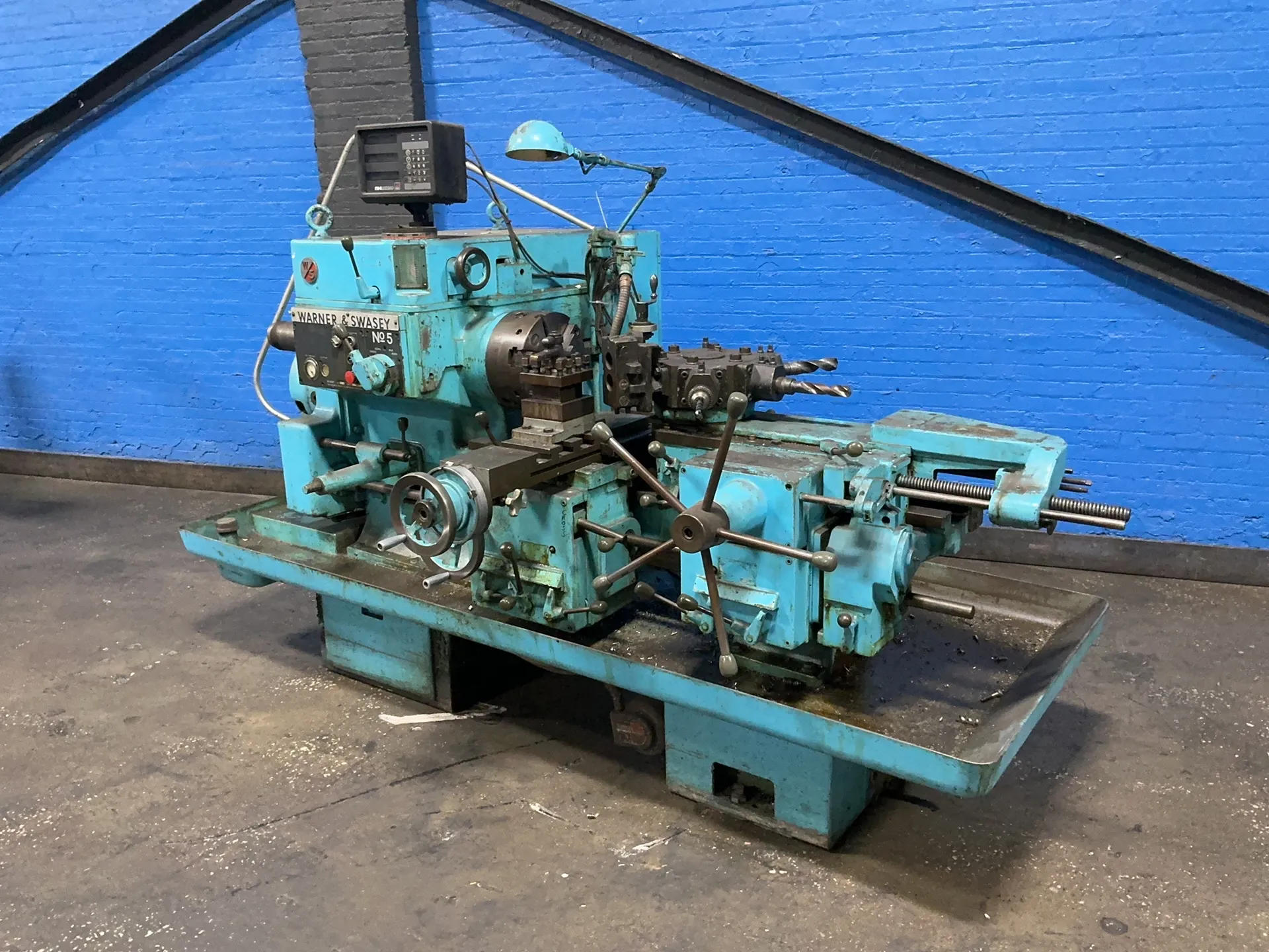 19" x 20" Warner & Swasey #M-4660, turret lathe, 12" 3-jaw chuck, 2.5" bore, tool post, tool changer