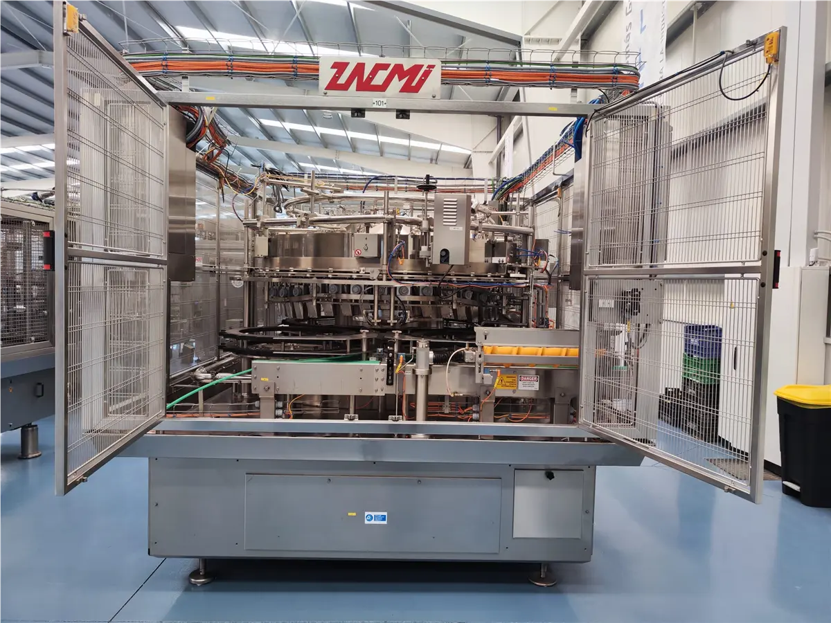 Zacmi #0234-B-040, 40-pocket rotary telescopic filler, 330 containers/minute, 500 gr, Tetra Recart format