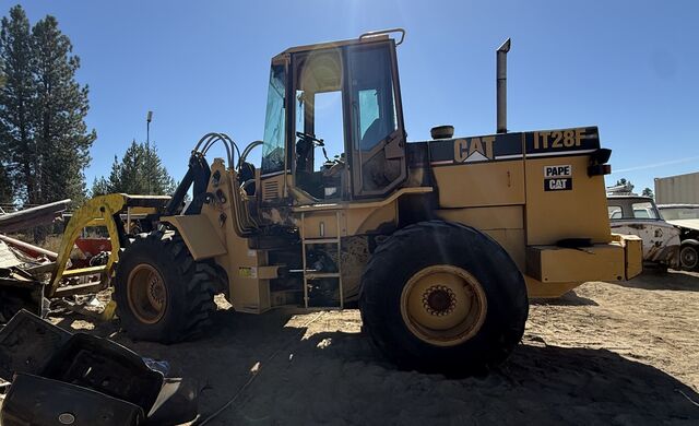 25,200 lb. Caterpillar #IT28F, Wheel Loader Tool Carrier, 125 HP Cat 3116 DIT engine, enclosed cab, log fork