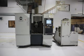 Haas No. Multigrind-CA, 24.8" X, 13.58" Y, 16.92" Z, 40 HP, 8 turret, Sinumerik 840SL, tailstock, 2011
