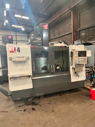 Haas #VF-4, CNC vertical machining center with full 4th Axis, 50" X, 20" Y, 25" Z, 8100 RPM, 24+1 side mount