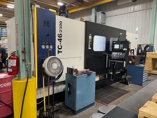 YCM #TC-46/2300, 33.5" swing, 28" swing over cross slide, 99" centers, 3-jaw 24" chuck, 1200 RPM, Fanuc