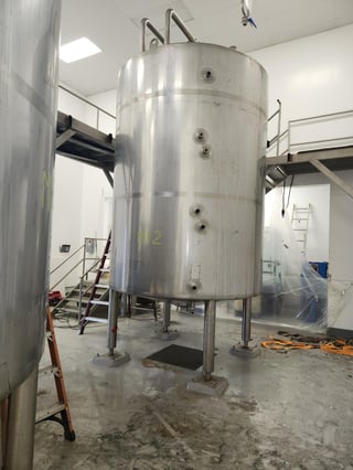 3000 gallon Tanks, 9ft. diameter, Mixer, Heat Jacket (2 available)